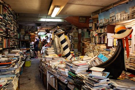 Books In Boats At The Libreria Acqua Alta Bookstore in Venice