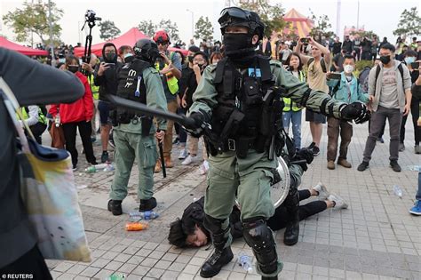 Hong Kong riot police berak up a solidarity rally for China's Uighurs ...