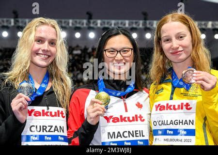 Claire Curzan of United States of America shows the gold medal after ...