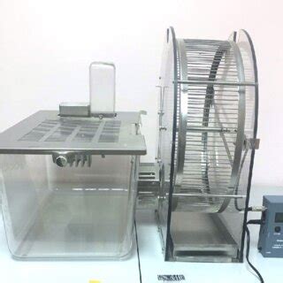 A cage equipped with voluntary rat running wheel with activity wheel ...