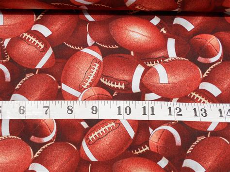 Fabric-1/2 or 1 yard piece 4781-Packed Brown Football | Etsy in 2021 ...