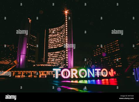 Toronto city hall by night Stock Photo - Alamy