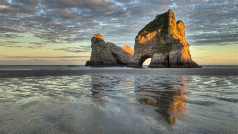 New Zealand’s Wharariki Beach is Heaven on Earth - Vagabond Summer