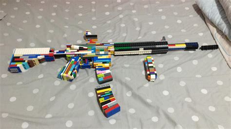 So I make my lego HK416 with some attachments(red dot sight, grip ...