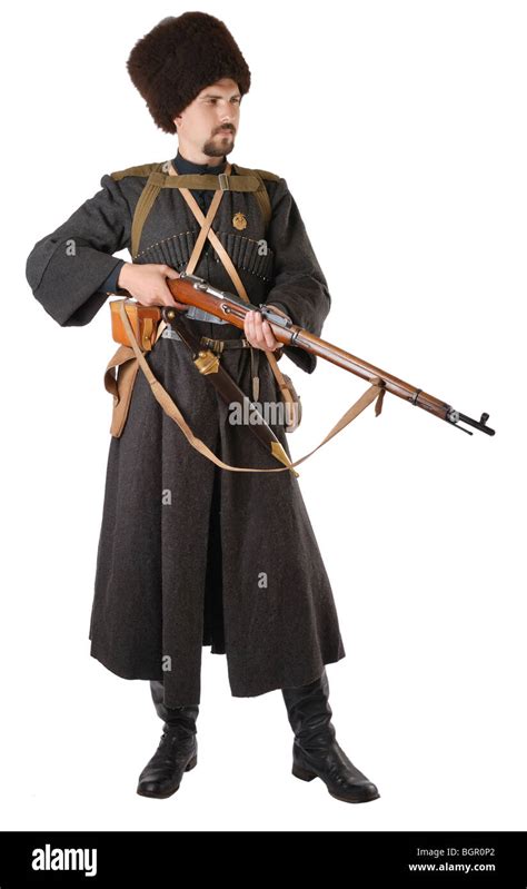 Man in vintage costume of Russian Cossack with a rifle Stock Photo ...