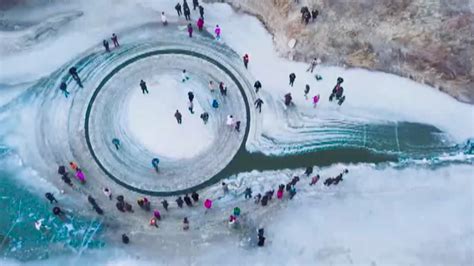 Spinning ice circle in frozen river in NE China is ‘natural’ - CGTN