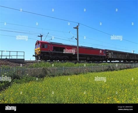 DB Schenker Class 66 Locomotive 66128 Leads a Freight Train Past Northampton, UK Stock Photo - Alamy