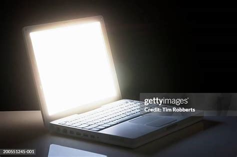 4,860 Glowing Laptop Screen Stock Photos, High-Res Pictures, and Images ...