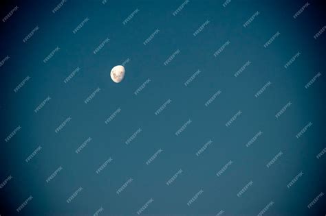 Premium Photo | White moon on the blue sky