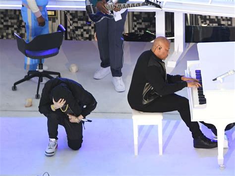 Eminem takes a knee during the Super Bowl halftime show : NPR