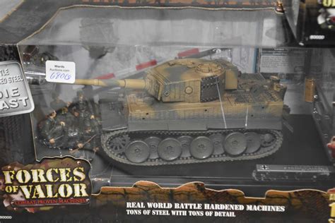 Three Forces of Valor 1:32 scale die cast tanks including "German Tiger I", "German King Tiger" and