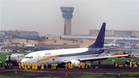 Mumbai rains: Main airport runway shut, 200 flights cancelled | City ...