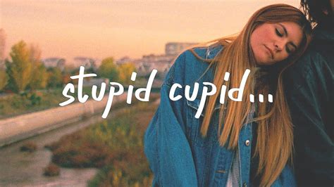 Jenna Raine - Stupid Cupid (Lyrics) - YouTube Music