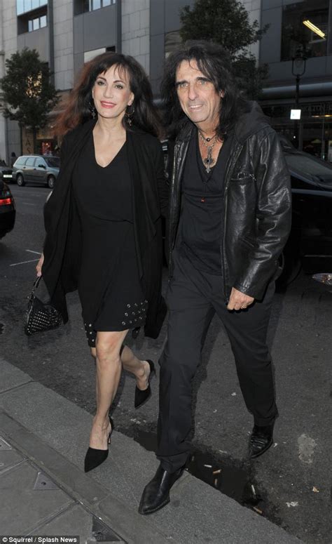 Alice Cooper let's his wife wear the eyeliner as they enjoy a dinner date in London | Daily Mail ...