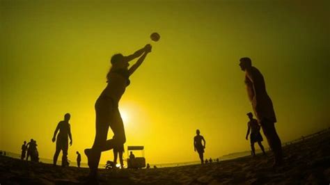 Silhouette Volleyball Players On Beach Sunset Stock Footage Video (100% ...