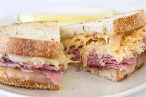 Reuben Sandwich | Our Reuben consists of grilled rye bread topped with corned beef ... | Cooking ...