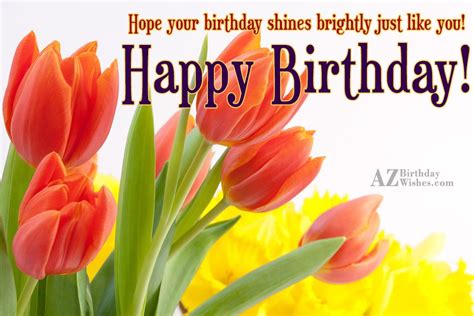 Wishing birthday with orange tulips in the background ...