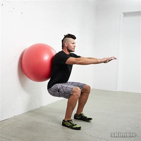 Wall Ball Squats - Exercise How-to | Workout Trainer by Skimble.com