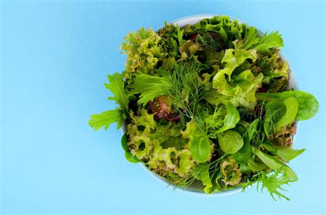 Bowl of mixed salad on bright, color background. 5431295 Stock Photo at Vecteezy