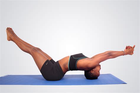 Young athletic woman doing yoga pose