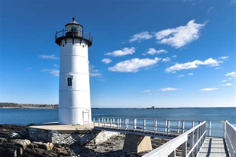 The Portsmouth Harbor Lighthouse in New Castle, NH overlooks the Piscataqua River and the ...