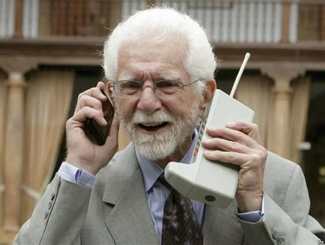 Martin Cooper, the inventor of the first mobile phone (right), multi ...