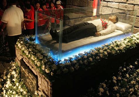 Amid protests, Philippine dictator buried at heroes cemetery | The Seattle Times