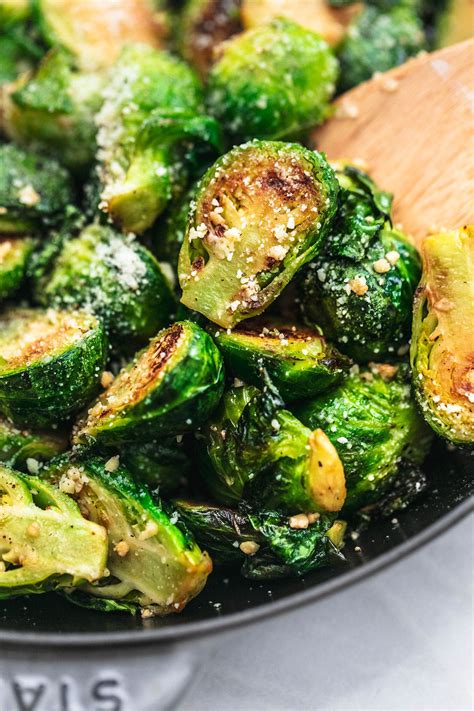 The BEST quick and easy Sauteed Brussels Sprouts recipe with garlic and parmesan. These ...