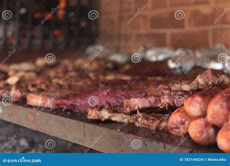 Asado. Roast. Barbeque stock photo. Image of fire, barbecue - 182144024