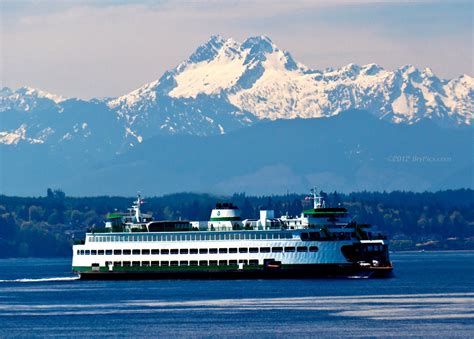 Washington State ferry coming in to Edmonds. The Olympic Mountain range in the distance ...