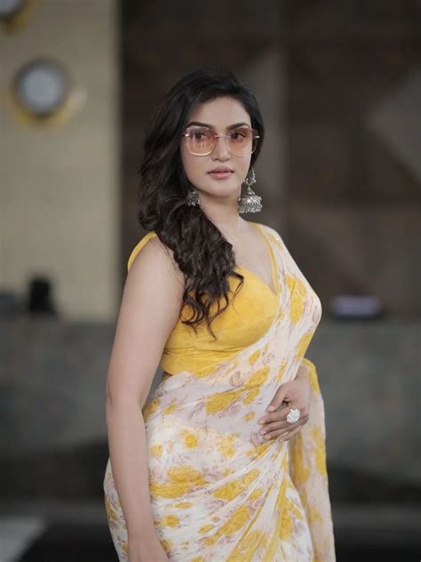 Malayalam Actress Honey Rose Lights Up In A Yellow Floral Saree