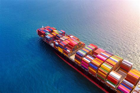 Aerial view of container cargo ship in sea. | Registrar