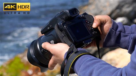 Photographer Adjusting Camera Settings, Stock Footage | VideoHive