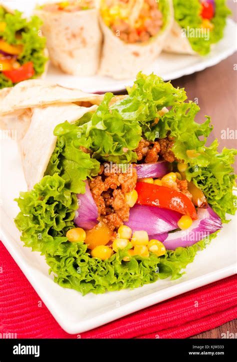 Traditional burrito in tortilla wrap Stock Photo - Alamy