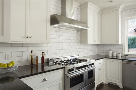 Modern-Kitchen-With-White-Subway-Tile-478427147-56a49fe65f9b58b7d0d7e2d4 - West of the Loop