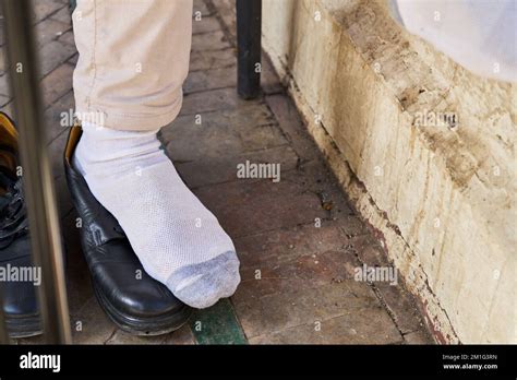 black shoes and white socks in a comfortable situation Stock Photo - Alamy