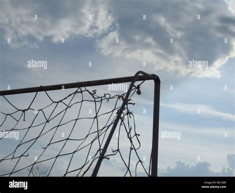 silhouette detail old football goal posts in field Stock Photo - Alamy