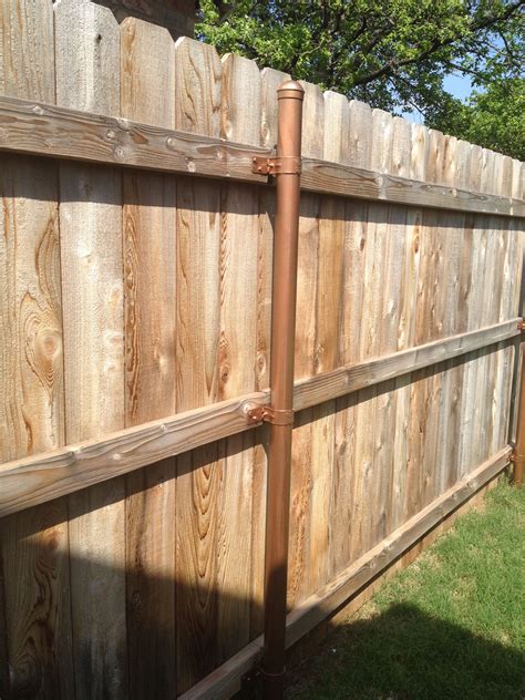 New House. NOT a fan of the galvanized fence posts. Just finished spray ...