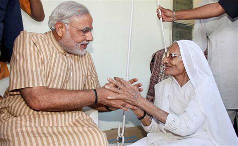 Images: Modi celebrates victory with mother, Keshubhai - Photos News , Firstpost