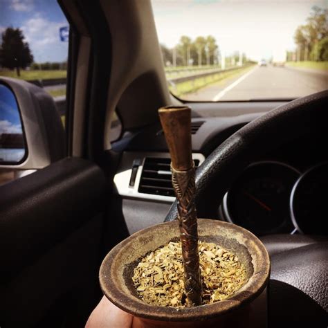 Premium Photo | Close-up of mate drink in car