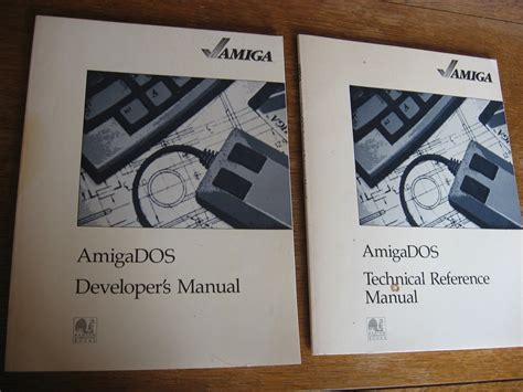 Amiga DOS Developer's Manual; AND, AmigaDOS Technical Reference Manual two manuals | var Amiga