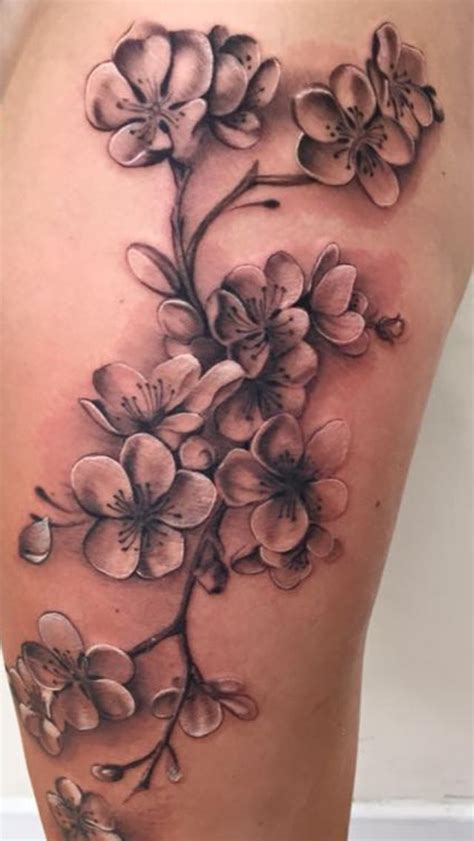 My cherry blossom tattoo in black and grey, on my left thigh. Absolutely love it! | Blossom ...