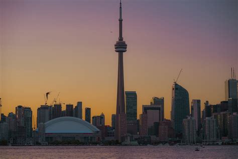 Sunset view of CN tower from Toronto Island · Free Stock Photo