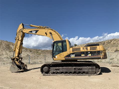 330 CL Excavator-CATERPILLAR – John J Dougherty