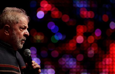 Lula vows 'peace and love' for polarized Brazil in comeback attempt | Reuters