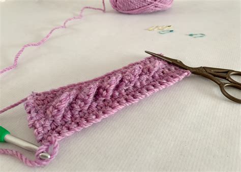 Crochet twisted cable stitch tutorial (with no post stitches!) - Dora Does