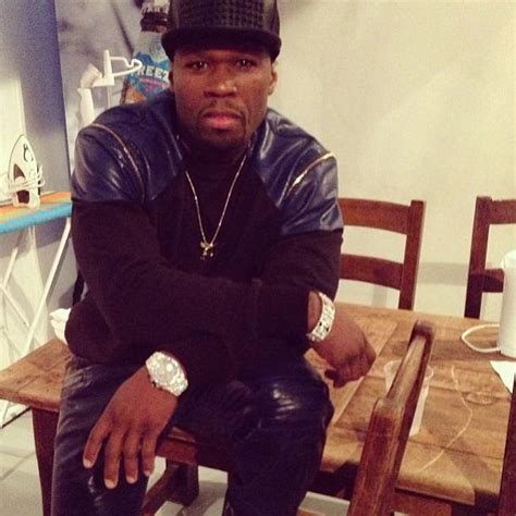 50 Cent is up watching a movie... the Jimmy Henchman trial! [VIDEO]