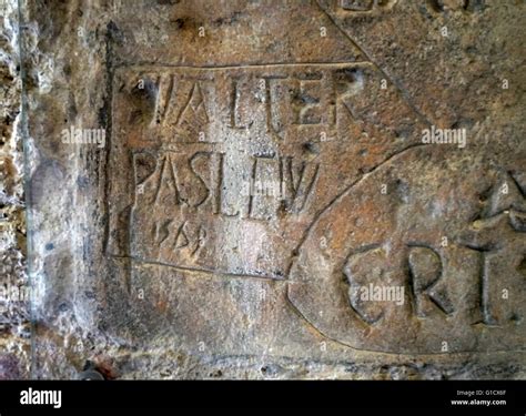 Names of prisoners carved into the walls of the Tower of London. Dated 16th Century Stock Photo ...