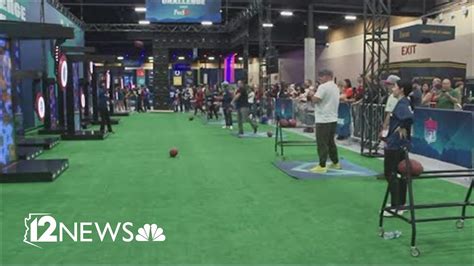 Super Bowl Experience opens at convention center - YouTube