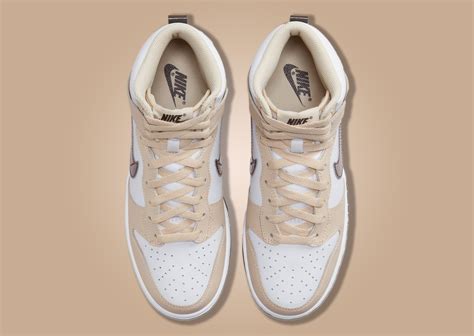 Nike's Dunk High Steps Out In A White And Beige Outfit - Sneaker News